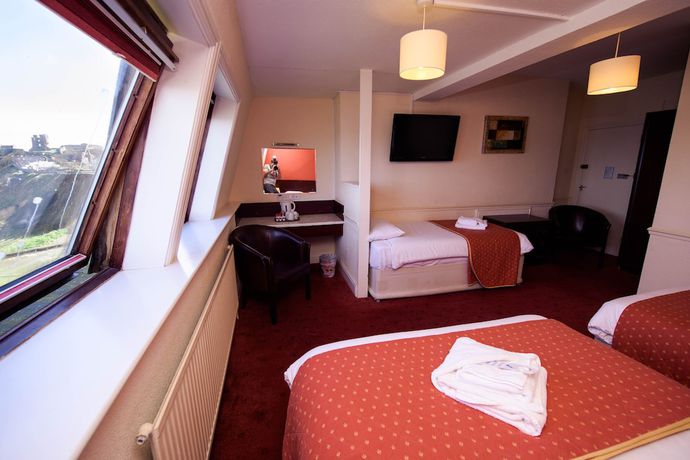 Imagen de la habitación del Hotel Delmont. Foto 16
