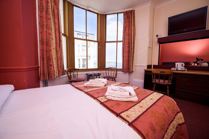 Imagen de la habitación del Hotel Delmont. Foto 18