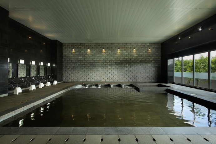 Imagen de la piscina del Hotel Delonix Karawang. Foto 19