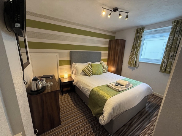 Imagen de la habitación del Hotel Delovely. Foto 1