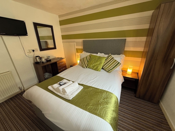 Imagen de la habitación del Hotel Delovely. Foto 2