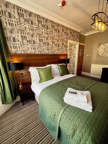 Imagen de la habitación del Hotel Delovely. Foto 4