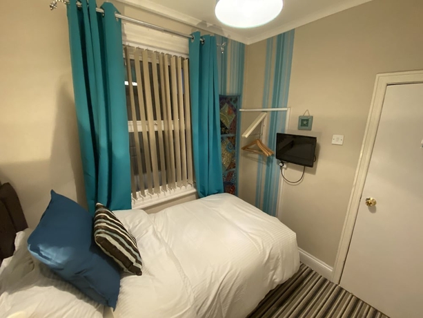 Imagen de la habitación del Hotel Delovely. Foto 5