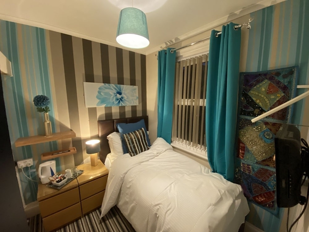 Imagen de la habitación del Hotel Delovely. Foto 6