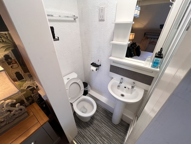 Imagen de la habitación del Hotel Delovely. Foto 10