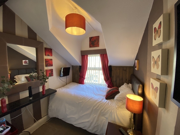 Imagen de la habitación del Hotel Delovely. Foto 13