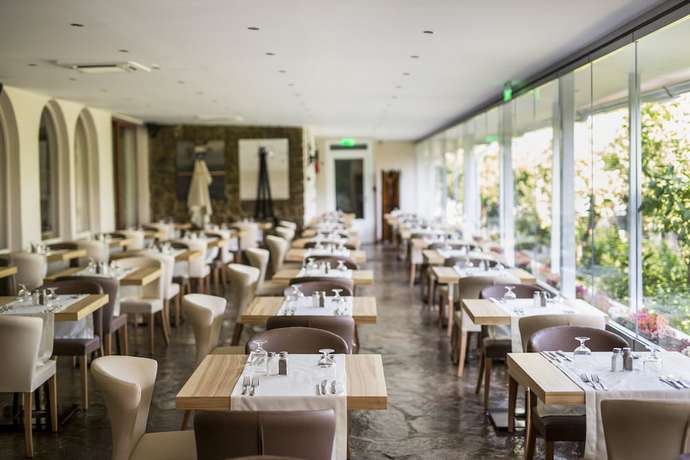 Imagen del bar/restaurante del Hotel Delphi Beach - All Inclusive. Foto 5