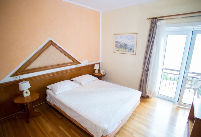 Imagen de la habitación del Hotel Delphi Palace. Foto 7