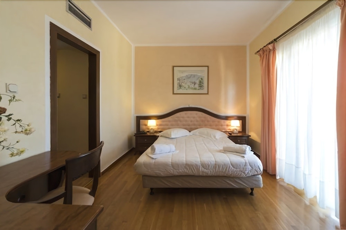 Imagen de la habitación del Hotel Delphi Palace. Foto 10