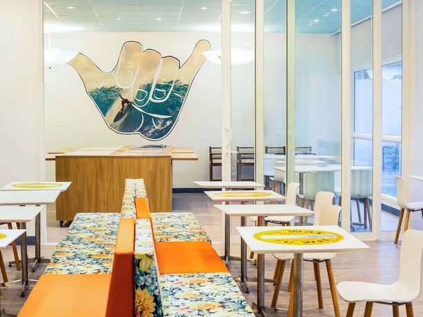 Imagen del bar/restaurante del Hotel Delphin Surf. Foto 8