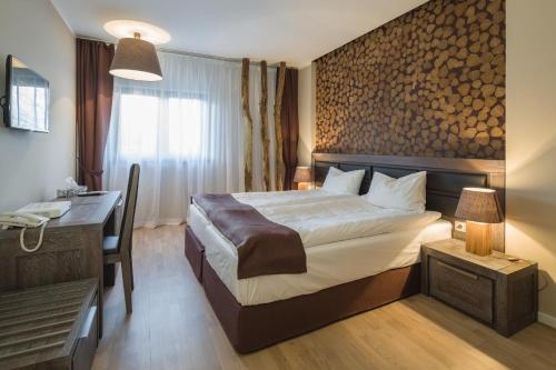 Imagen de la habitación del Hotel Delta Boutique and Carmen Silva Resort. Foto 6