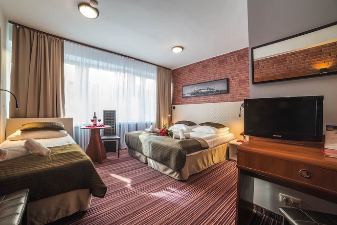 Imagen de la habitación del Hotel Delta, Cracovia. Foto 7