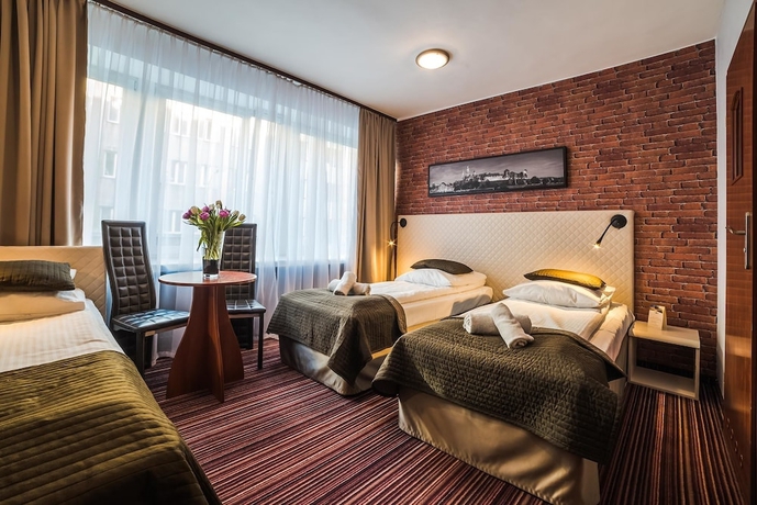 Imagen de la habitación del Hotel Delta, Cracovia. Foto 16