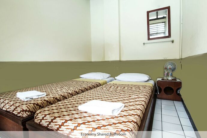 Imagen de la habitación del Hotel Delta Homestay. Foto 17