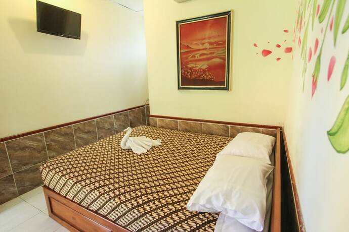 Imagen de la habitación del Hotel Delta Homestay. Foto 18