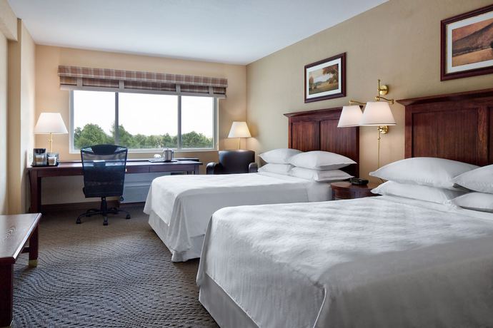 Imagen de la habitación del Hotel Delta Hotels by Marriott Midwest City at the Reed Conference Center. Foto 5