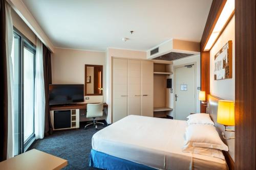 Imagen de la habitación del Hotel Delta Hotels by Marriott Olbia Sardinia. Foto 13