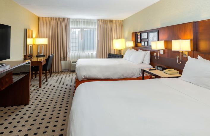 Imagen de la habitación del Hotel Delta Hotels by Marriott Utica. Foto 5