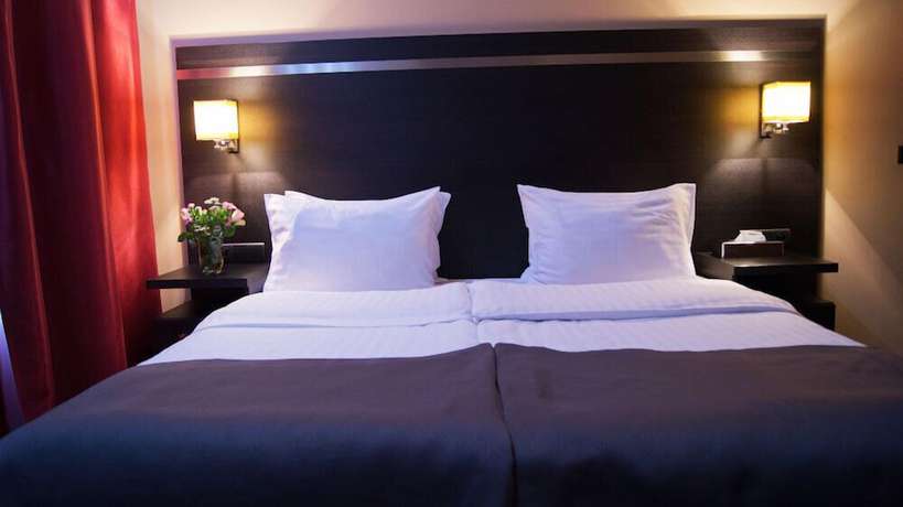 Imagen de la habitación del Hotel Delta In. Foto 9