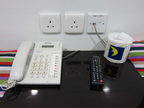 Imagen de la habitación del Hotel Delta, Kowloon. Foto 6