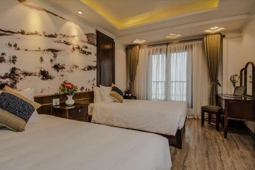 Imagen de la habitación del Hotel Delta Sapa. Foto 7