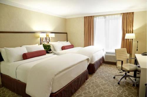 Imagen de la habitación del Hotel Delta by Marriott Hotels New York Times Square. Foto 9