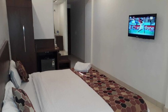 Imagen de la habitación del Hotel Delux Inn, Agra. Foto 3