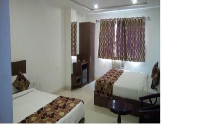 Imagen de la habitación del Hotel Delux Inn, Agra. Foto 4