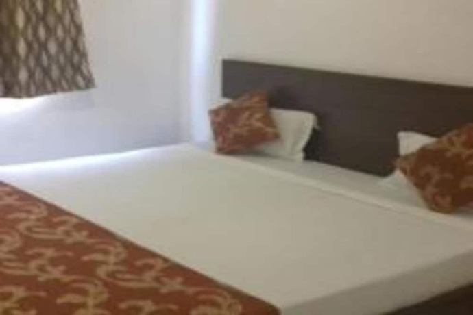 Imagen de la habitación del Hotel Delux Inn, Agra. Foto 7