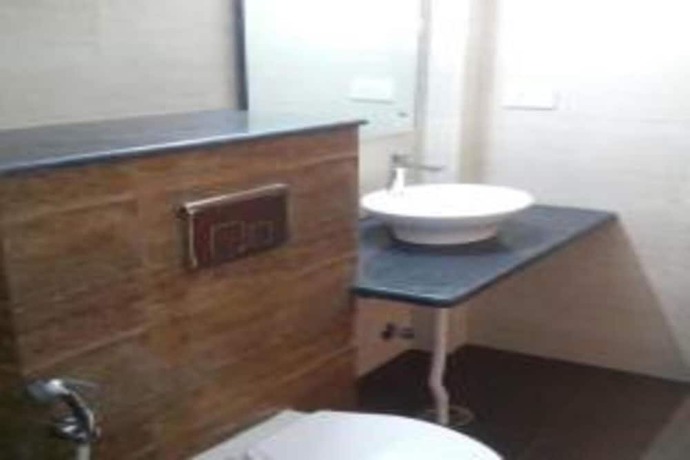 Imagen de la habitación del Hotel Delux Inn, Agra. Foto 9