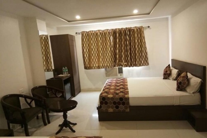 Imagen de la habitación del Hotel Delux Inn, Agra. Foto 10