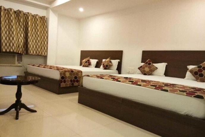 Imagen de la habitación del Hotel Delux Inn, Agra. Foto 13
