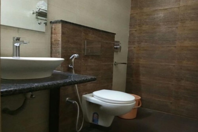Imagen de la habitación del Hotel Delux Inn, Agra. Foto 14