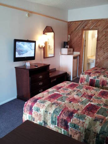 Imagen de la habitación del Hotel Delux Inn. Foto 6