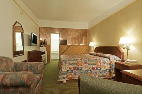 Imagen de la habitación del Hotel Delux Inn. Foto 10