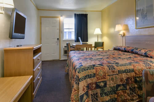 Imagen de la habitación del Hotel Delux Inn. Foto 13