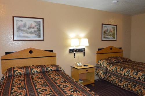 Imagen de la habitación del Hotel Delux Inn Tulsa. Foto 3