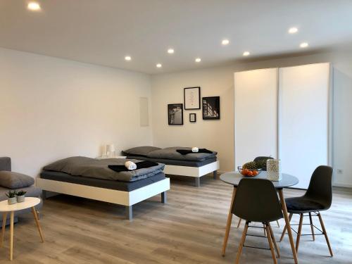 Imagen de la habitación del Hotel Deluxe Apartments Messe Flughafen. Foto 14