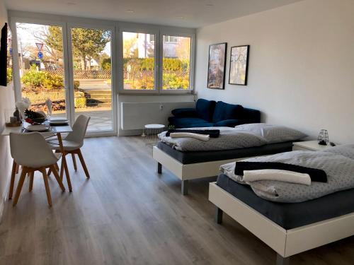 Imagen de la habitación del Hotel Deluxe Apartments Messe Flughafen. Foto 16