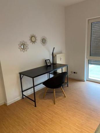 Imagen de la habitación del Hotel Deluxe Apartments Messe Flughafen. Foto 20