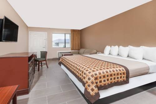 Imagen de la habitación del Hotel Deluxe Inn Denton. Foto 3