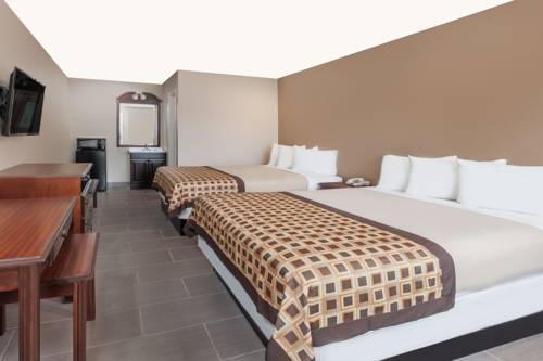 Imagen de la habitación del Hotel Deluxe Inn Denton. Foto 6