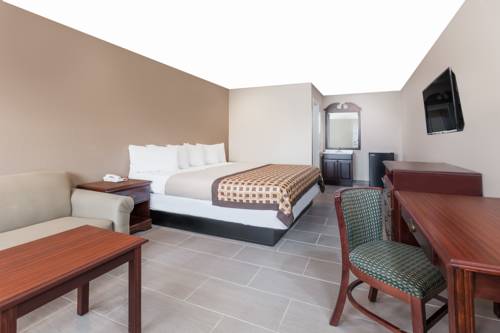 Imagen de la habitación del Hotel Deluxe Inn Denton. Foto 8