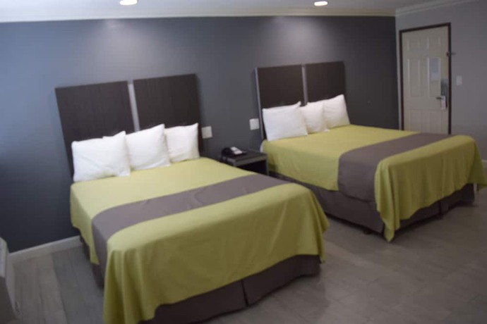 Imagen de la habitación del Hotel Deluxe Inn Hawthorne. Foto 3
