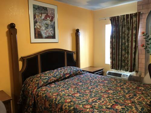 Imagen de la habitación del Hotel Deluxe Inn, Indio. Foto 3