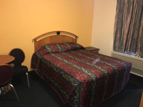 Imagen de la habitación del Hotel Deluxe Inn, Indio. Foto 4
