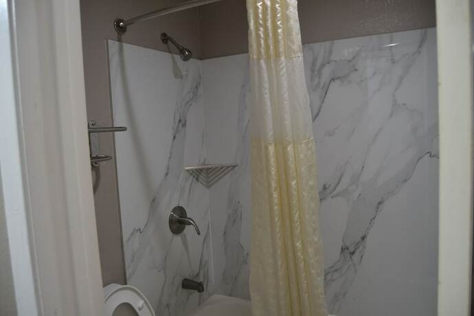 Imagen general del Hotel Deluxe Inn, Irving. Foto 6