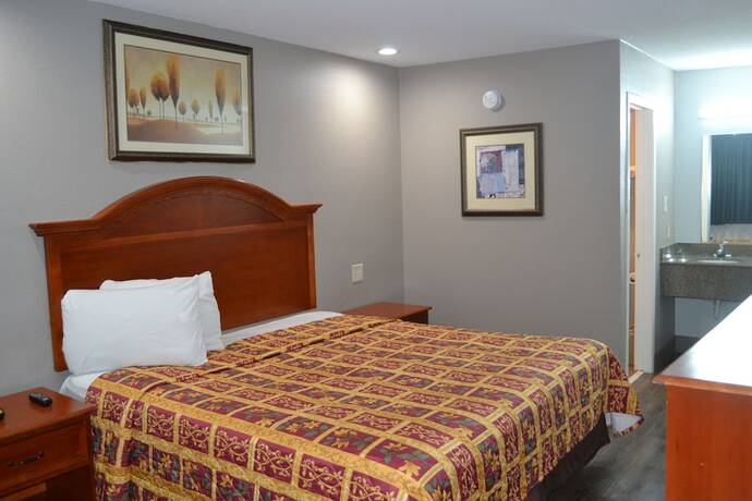 Imagen de la habitación del Hotel Deluxe Inn, Irving. Foto 16