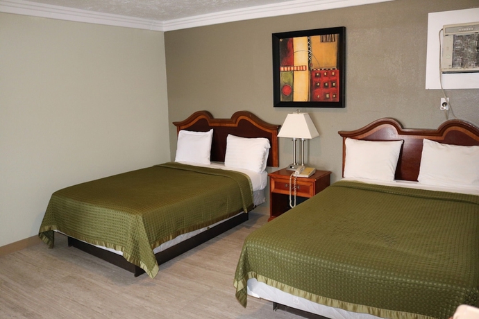Imagen de la habitación del Hotel Deluxe Inn Motel, Lake Charles. Foto 12