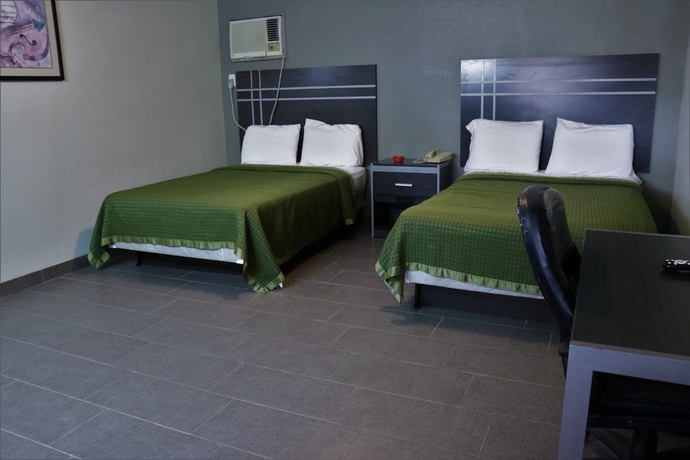 Imagen de la habitación del Hotel Deluxe Inn Motel, Lake Charles. Foto 13